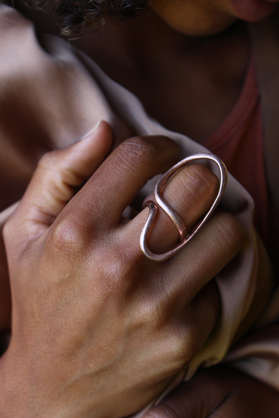Never ending long ring in rose gold