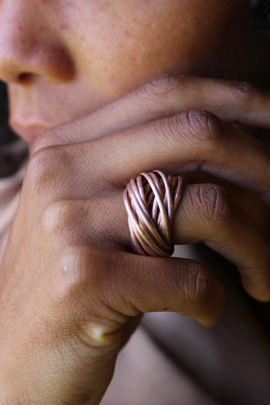 Intertwined ring rose gold