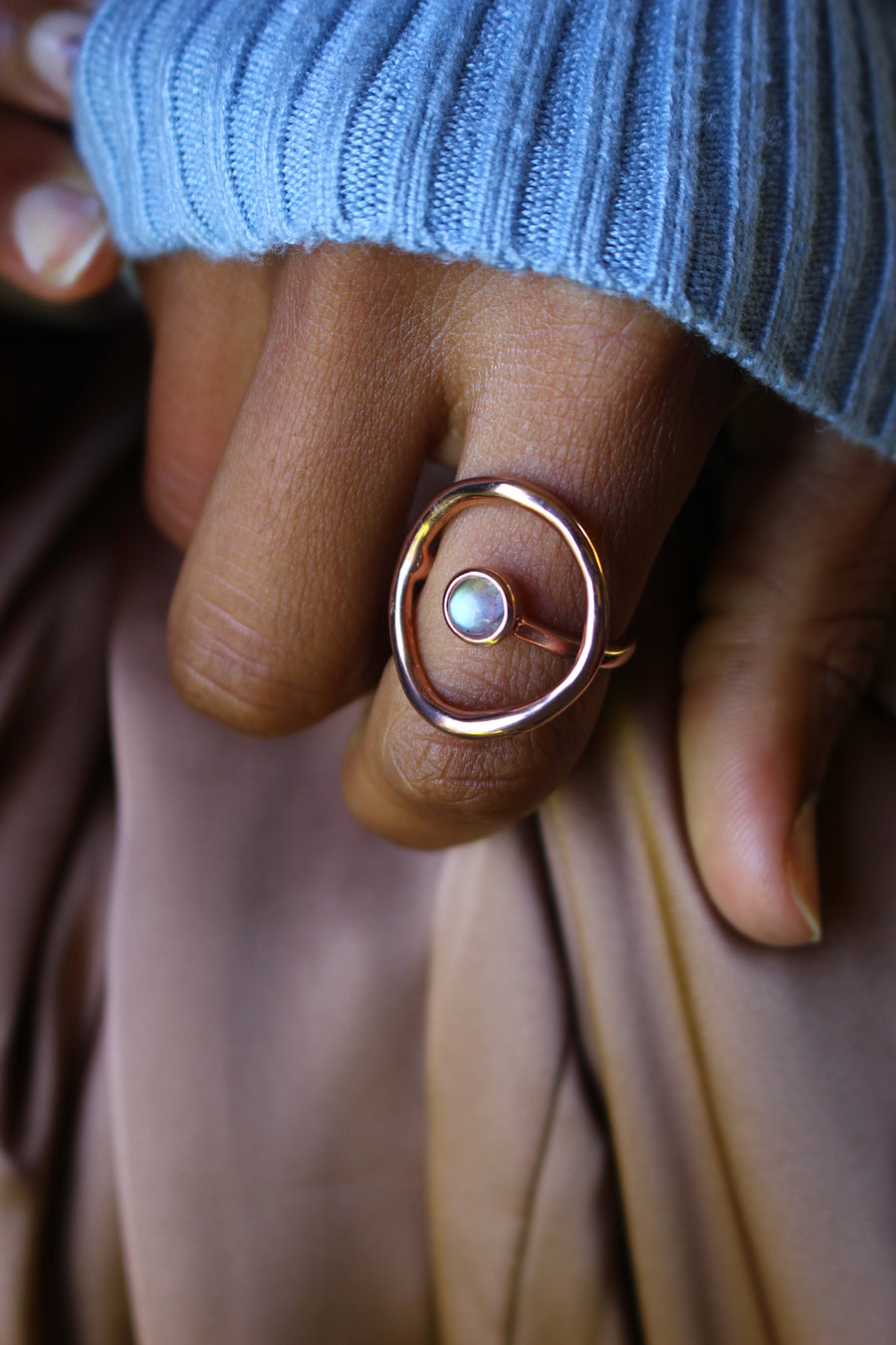 Around the world ring in rose gold