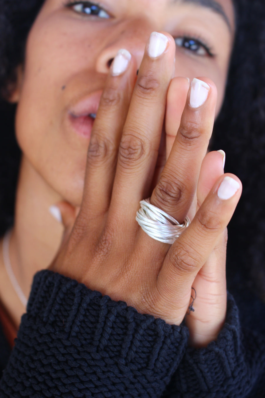 Intertwined ring silver