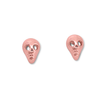 Skull studs in rose gold